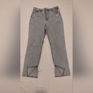 Blue white-washed jeans, size 31, slits at the bottom